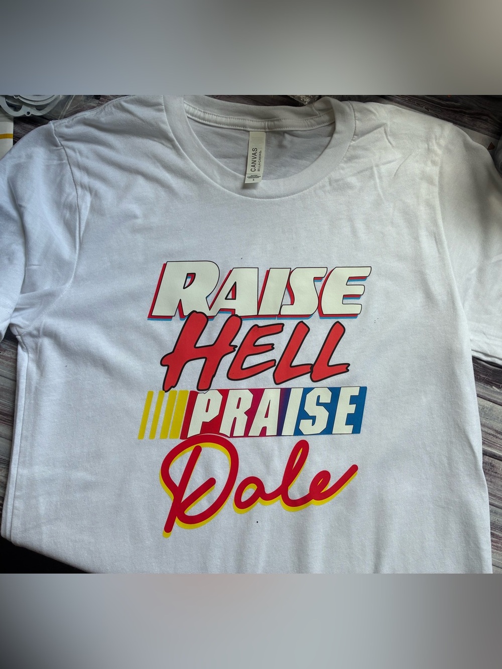 White Graphic Tee - "Raise Hell Praise Dale"